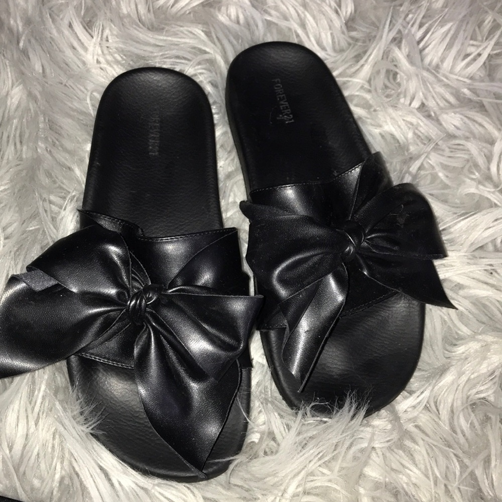 Black leather slides